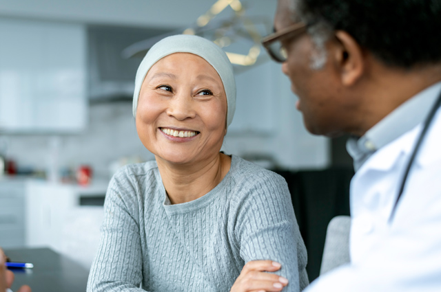 cancer patient talks with doctor