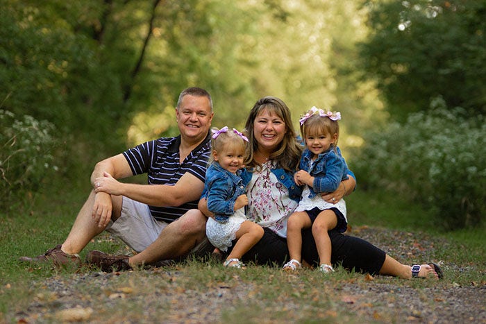 Portrait of Jodi Hafemeister, Mammotome Director Physician Relations and Professional Education, and her family.
