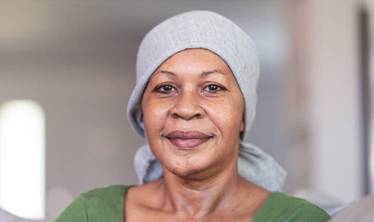 A woman wearing a head scarf
